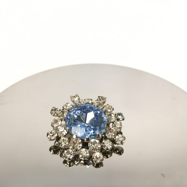Brosch blå ca 3cm.